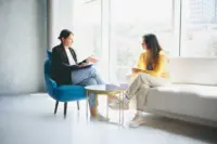 Two women in a therapy session.