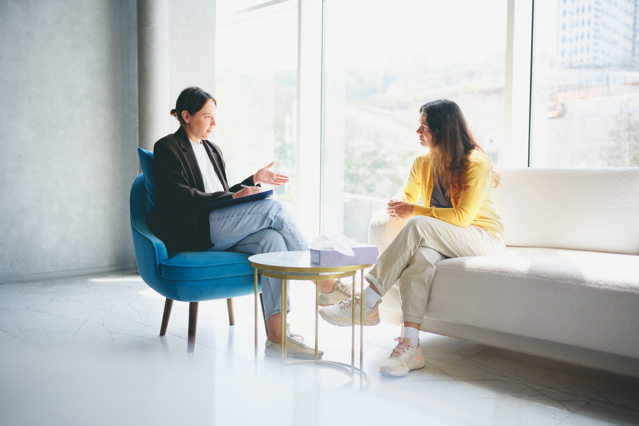 Two women in a therapy session.